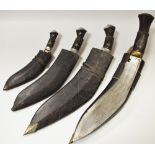 Indian Kukri knives in leather scabbards