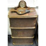 An early 20th century trunk; a pair of fire bellows; a mantel clock.