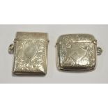 Two silver vesta cases, both with vacant cartouches,