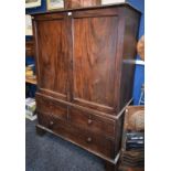 A George III mahogany 'linen press',