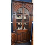 A 19th century oak Country House floor standing corner vitrine/display cabinet,
