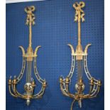 A pair of 'gilt' metal lyre shaped wall lights (2)