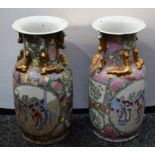Ceramics - a pair large Chinese baluster vases, decorated with panels depicting courtly scenes,