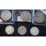 Coins - a George V shilling, 1826; a Victorian shilling, 1895; another, similar,