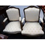 A pair of Louis XVI inspired caquetoire/open armchairs (2)