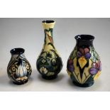 Ceramics - a Moorcroft Viola pattern baluster vase, signed to the base, dated 1994, J Moorcroft,