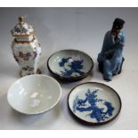 A Chinese blue and white bowl; an Armorial vase and cover; a figure,