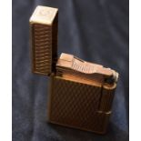 An ST Dupont vintage gold plated pocket lighter,