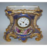 A 19th century Paris porcelain cartouche shaped mantel clock, white enamel dial inscribed J.