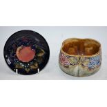 A Moorcroft Finches pattern pin tray, boxed; a Doulton lambeth tube lined fluted bowl,