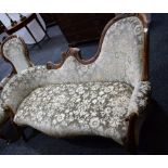 A Victorian three piece drawing room suite comprising day bed sofa and 'his and hers' chairs (3)