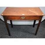 A George III mahogany side table, oversailing rectangular top above a single frieze drawer,