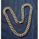 A rose metal Albert chain, marks worn possibly 375, 37cm long,