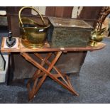 A brass coal scuttle; another smaller; graduated measures; slipper box;