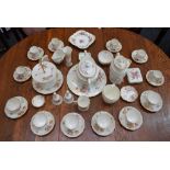 A Royal Crown Derby Posies pattern tea and coffee set including two tier cake stand,