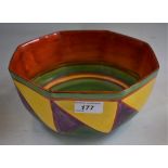 A Clarice Cliff Newport pottery octagonal bowl, geometric design in tones of orange, green,