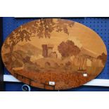 An oval marquetry panel depicting a waterside castle,