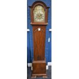 A mahogany 'grandmother' clock, arched dial with silvered chapter ring, Roman numerals,