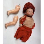 An Armand Marseille baby doll, sleeping brown eyes, closed mouth, composite jointed body,