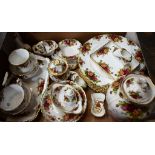 A Royal Albert Old Country Roses pattern vase and cover, dinner plates, sandwich trays, pepper,