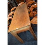 A Farmhouse elm and pine refectory table, slightly oversailing rectangular top above a deep frieze,