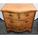 A George III style walnut serpentine bachelors chest,