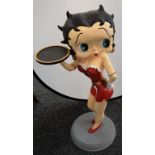 A floor standing figure, Betty Boop, arm outstretched holding a plateau,