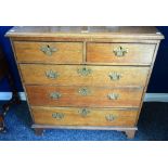 A George III oak chest, moulded rectangular top above two short and three long graduated drawers,