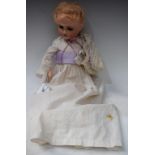 An early 20th century Armand Marseille Floradora socket head doll, sleeping brown eyes,