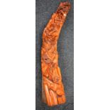 A substantial Chinese hardwood carving, of elders on a rocky landscape,
