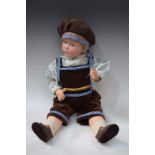 A Gebruder Heubach bisque head pouty character boy doll, with open eyes, closed mouth, blond wig,