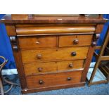 A Victorian mahogany chest, slightly oversailing rectangular top above a frieze drawer,
