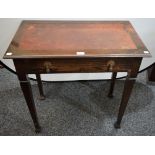 An Arts and Crafts oak writing table, of small proportions,