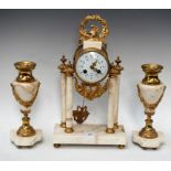 A French portico clock garniture, gilt brass mounted,