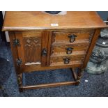 A Gothic inspired oak side cabinet, of small proportions,