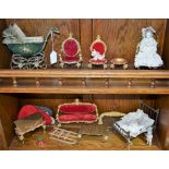 Dolls house furniture including perambulator, bed, four-piece drawing room suite, miniature dolls,