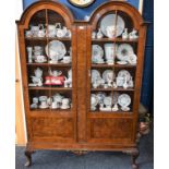 A Queen Anne inspired walnut and mahogany 'double-dome' display cabinet,