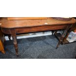 A 19th century mahogany side table, rounded rectangular top, ring-turned legs, 121.