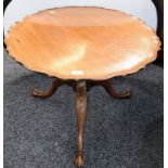 A Chippendale style mahogany occasional table, of low proportions, 'pie crust' top, turned column,