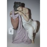 A Lladro figure of a classical maiden,