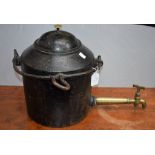 A 19th century cast iron hot water vessel, hooked swing handle, extended polished brass spout,