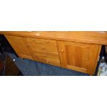 A contemporary oak sideboard,