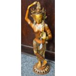 A bronzed metal figure, deity,