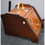 A late 19th century mahogany coal box,