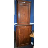A George III oak corner cupboard; another,