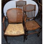 A pair of Jacobean Revival hall chairs;