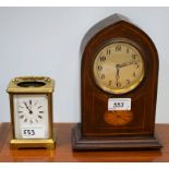 An Edwardian inlaid mahogany lancet mantel clock, silvered dial, Arabic numeral, 22.