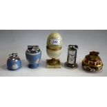 A Royal Crown Derby 1128 Imari table lighter; a Wedgwood Jasperware table lighter; another similar;