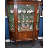 A Sheraton Revival mahogany and marquetry bowed break-centre display cabinet,