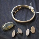 A silver bangle; agate and silver brooch;